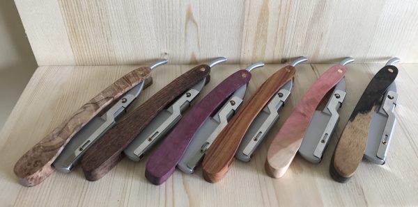 Exotic wood handles on 6 straight razors