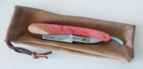 pink rosewood straight razor on sued bag